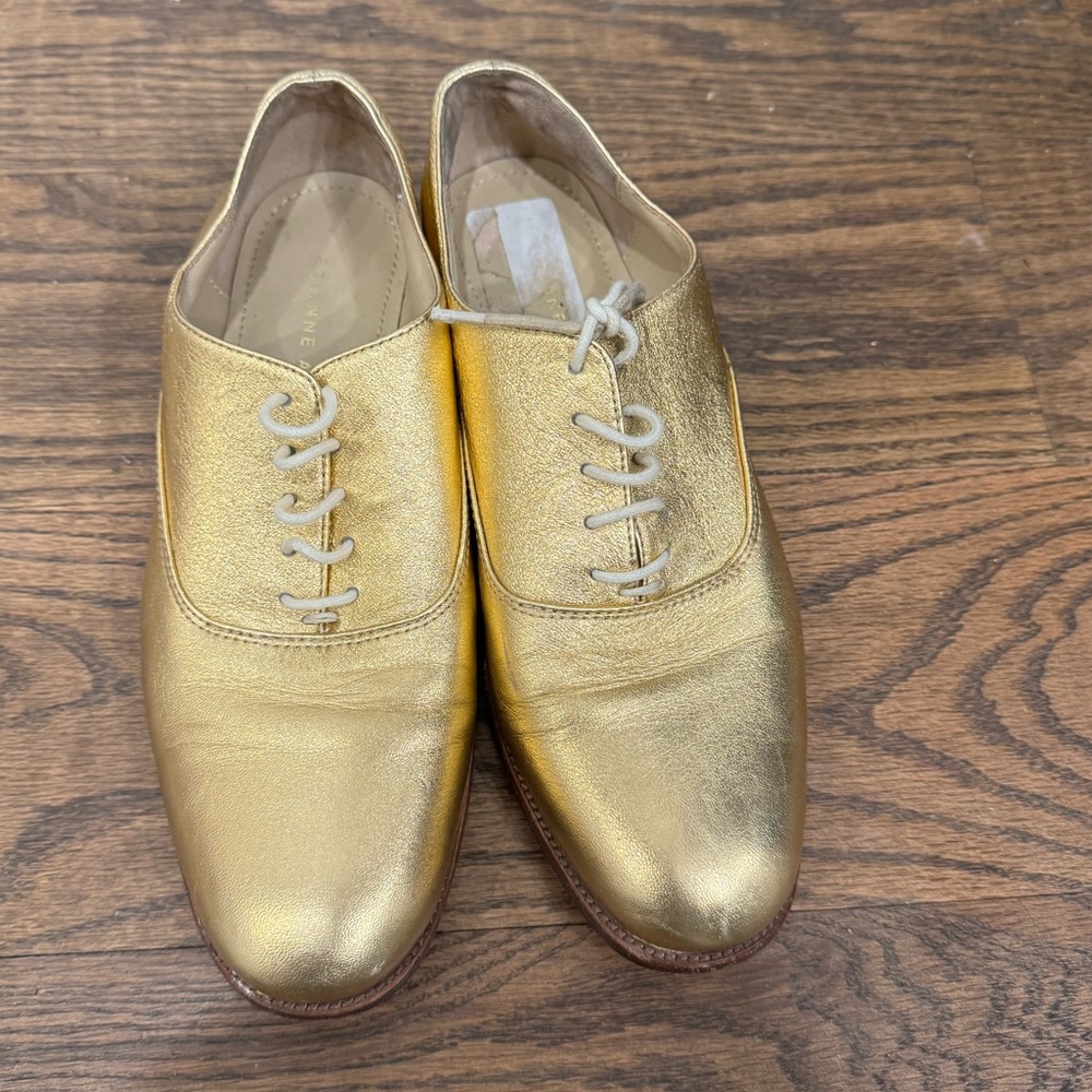 Etienne Aigner Gold Leather Flats